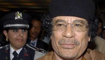 Kaddafi menace de poursuite un journal de Kampala qui lui prête une relation amoureuse