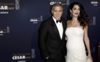 Photo-L'arrivée de Georges Clooney à la cérémonie des César, avec son épouse Amal qui exhibe son ventre rond