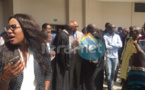 (04Photos) Abdoul Mbaye et son épouse à la sortie du Tribunal 