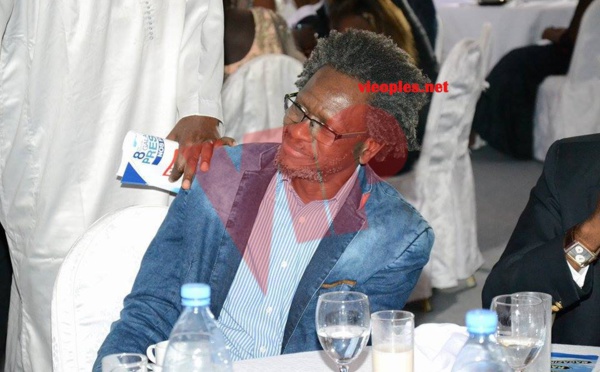 Photos: Pape Samba Kane (PSK) avec sa coiffure Afro à la Convention des jeunes reporters